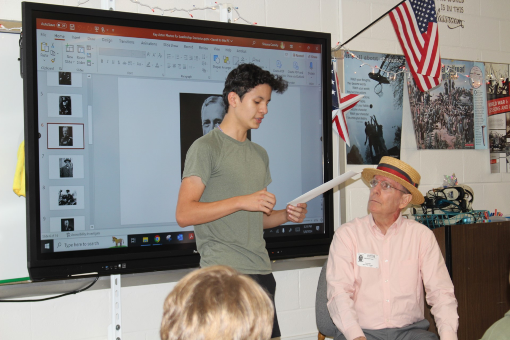 7th grade student, Emmanuel “Manny” Lazarte Cabrera interacts with the lesson with docent, Mike
Cash.